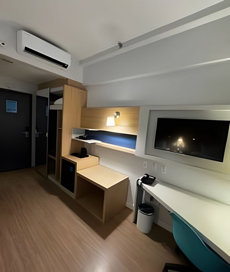 Studio com 2 camas na quadra da praia