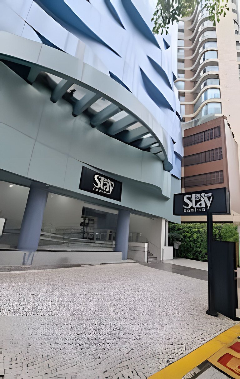 Studio com 2 camas na quadra da praia