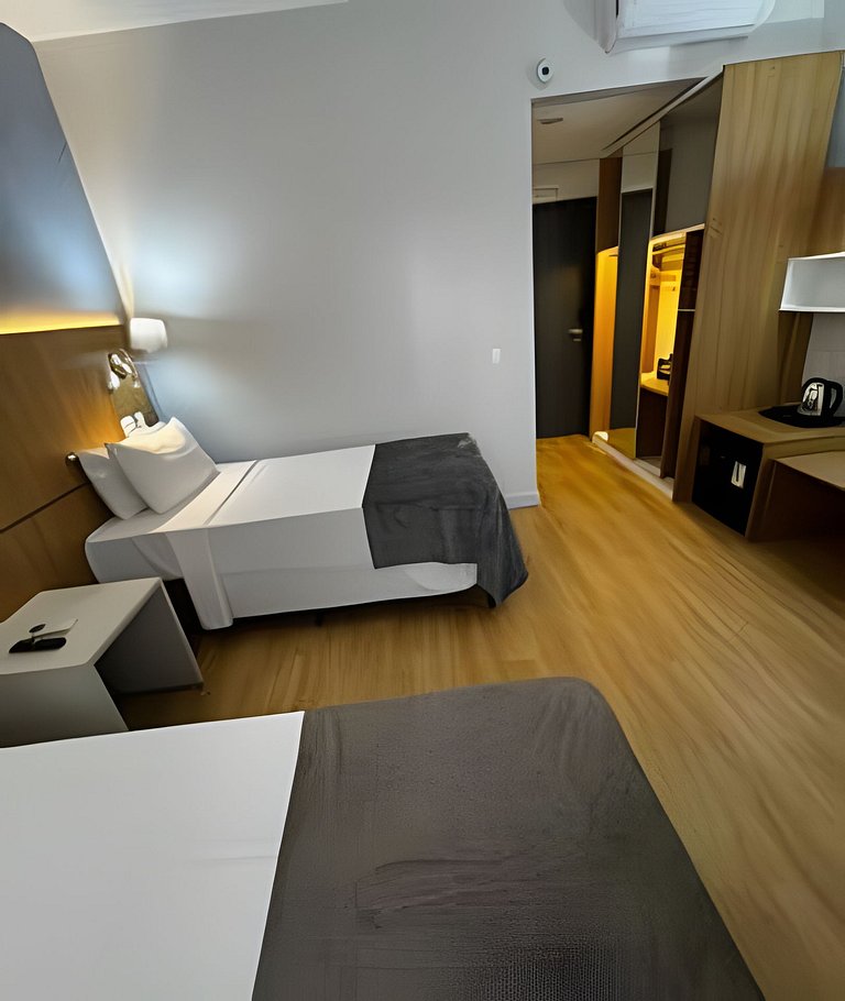 Studio confortável próximo à praia