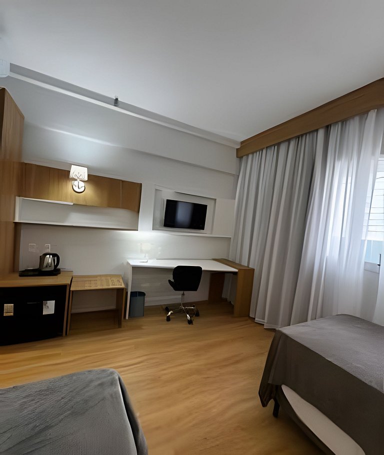 Studio confortável próximo à praia