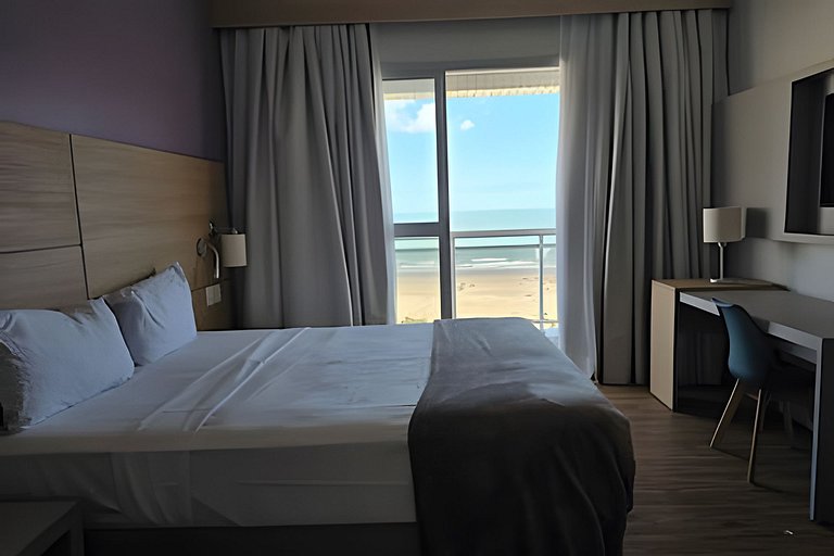 Studio aconchegante com varanda vista mar