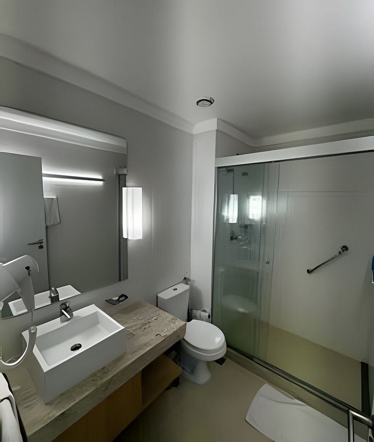 Studio aconchegante com varanda vista mar