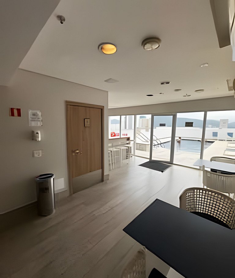 Studio aconchegante com varanda vista mar