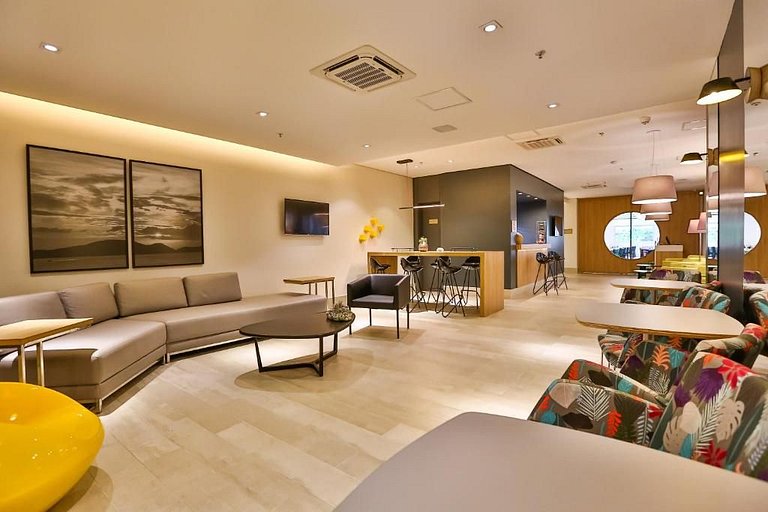 Studio confortável próximo à praia