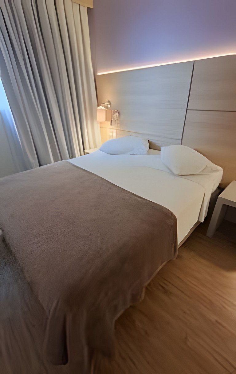 Flat a apenas 1 minuto da praia em Santos-SP