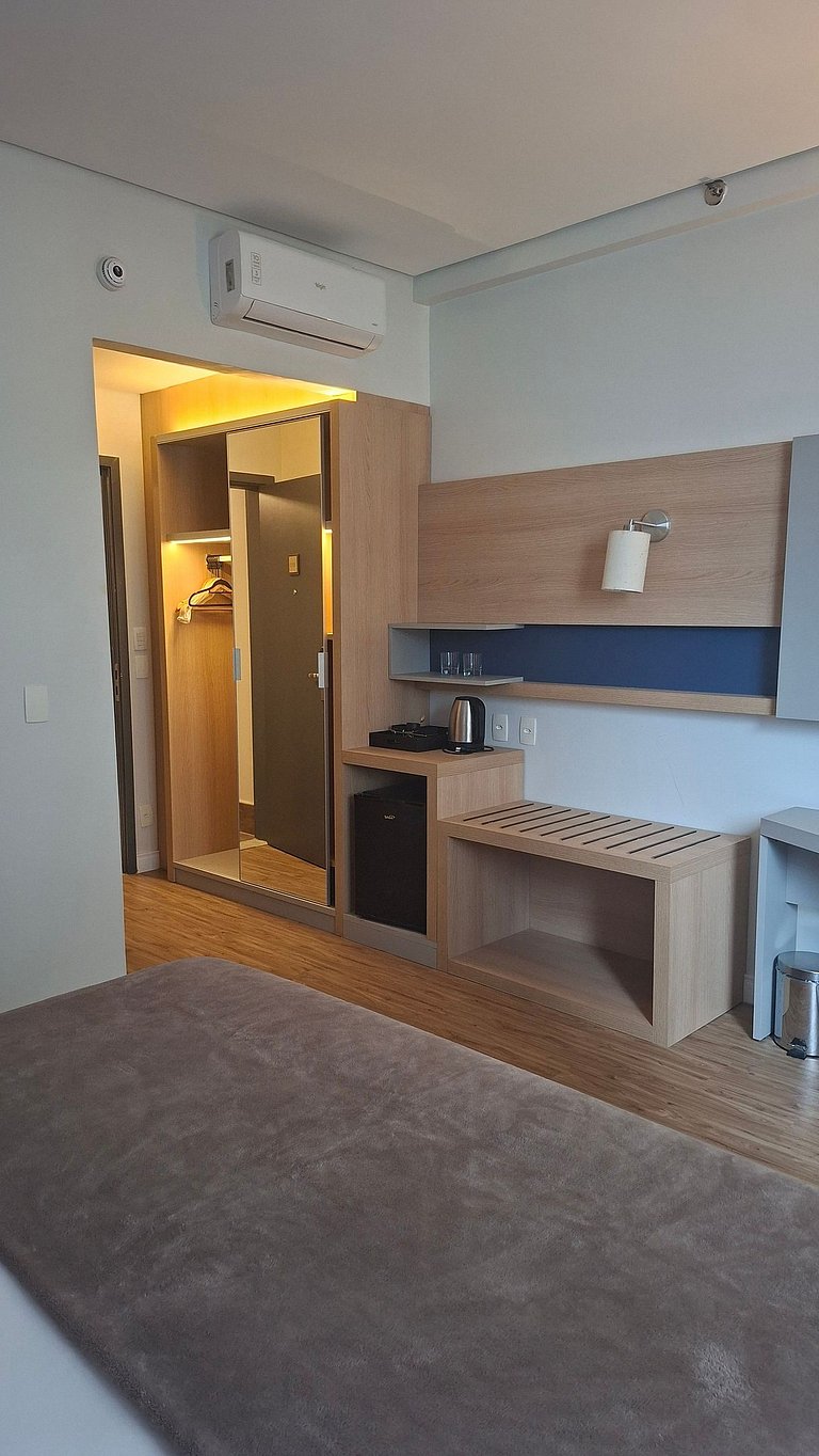 Flat a apenas 1 minuto da praia em Santos-SP