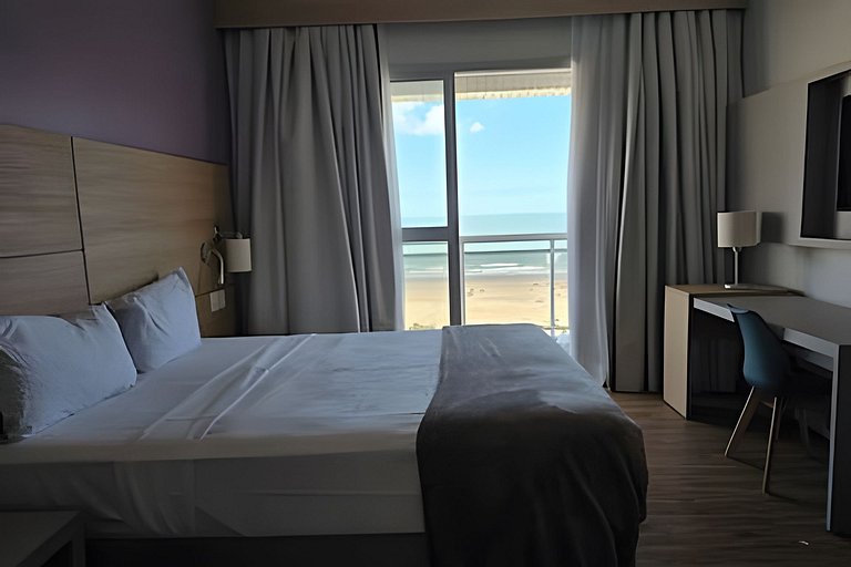 Studio aconchegante com varanda vista mar