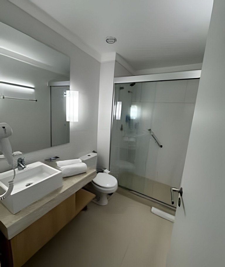 Flat com varanda e vista mar em Santos